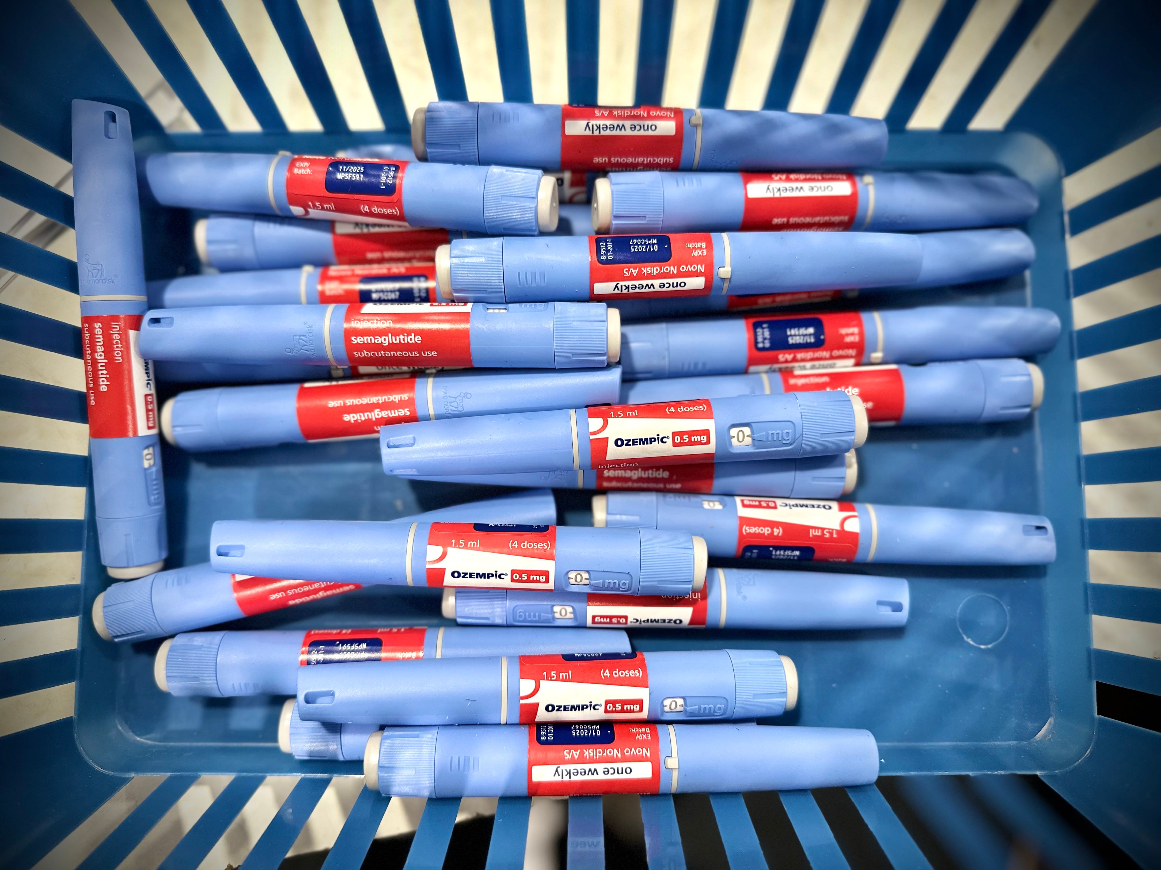 a tray of many ozempic pens